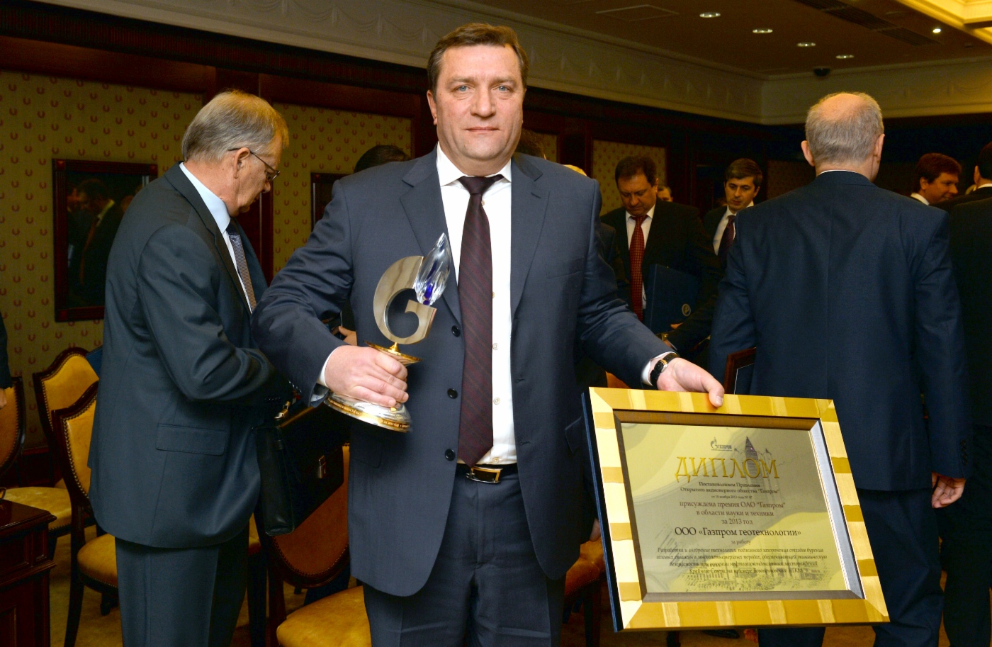 Research paper submitted by Gazprom Geotech for Gazprom 2013 Science and Technology Prize wins first prize. On photo – Director General of Gazprom Geotech Valery Khloptsov representing author team