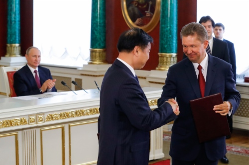 Supplementary Agreement to Sales and Purchase Agreement for gas to be supplied via eastern route signed in Moscow by Wang Yilin, Chairman of Board of Directors of CNPC, and Alexey Miller. Pictured: ceremonial exchange of signed documents in presence of Vladimir Putin, President of Russian Federation, and Xi Jinping, President of People’s Republic of China. Photo by TASS Supplementary Agreement to Sales and Purchase Agreement for gas to be supplied via eastern route signed in Moscow by Wang Yilin, Chairman of Board of Directors of CNPC, and Alexey Miller. Pictured: ceremonial exchange of signed documents in presence of Vladimir Putin, President of Russian Federation, and Xi Jinping, President of People’s Republic of China. Photo by TASS
