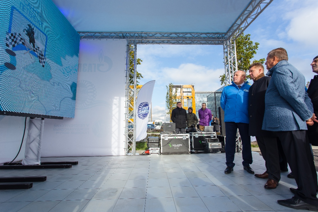 Alexey Miller (center right) takes part in festive reception of Gas into Motors motor rally featuring Gazprom natural gas vehicles