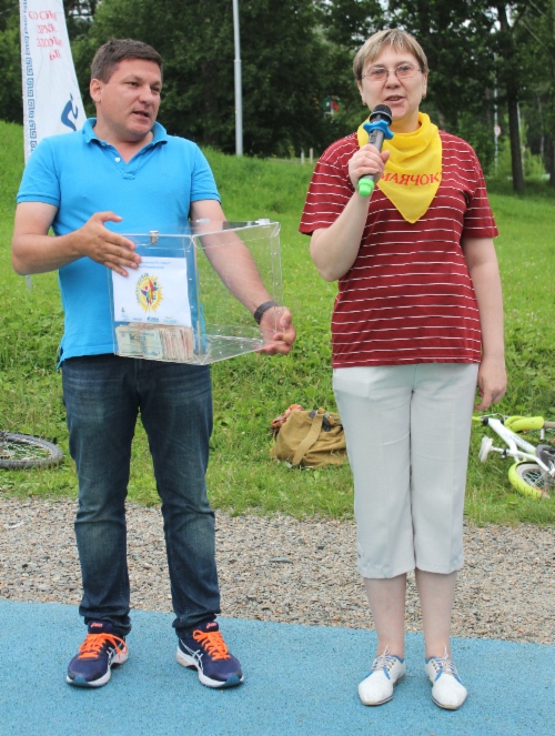 Handing over donations