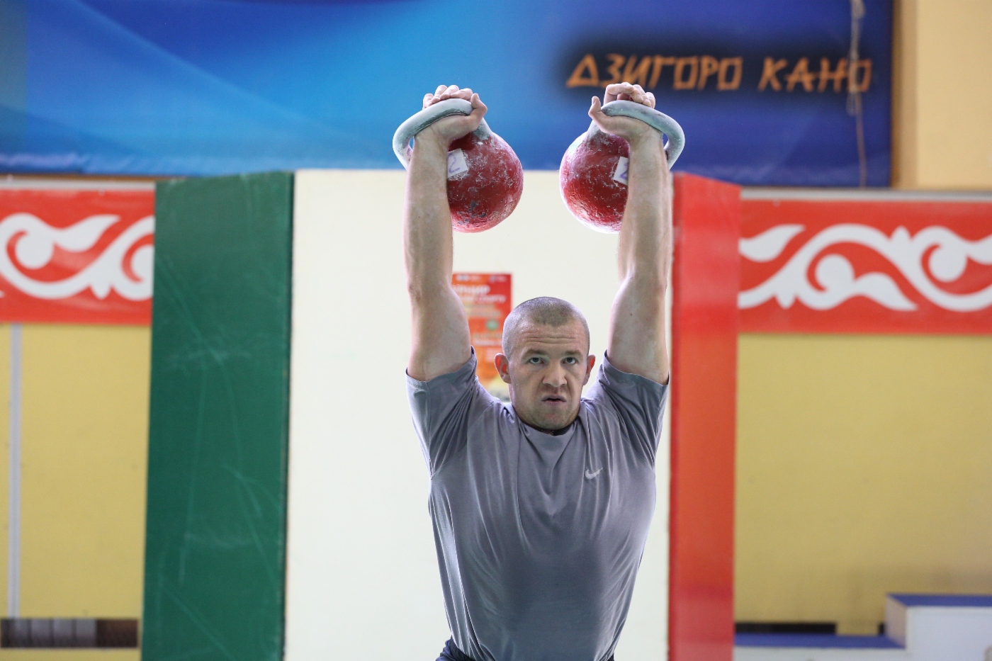 Kettlebell lifting competition. Weight category “90+ kilograms”
