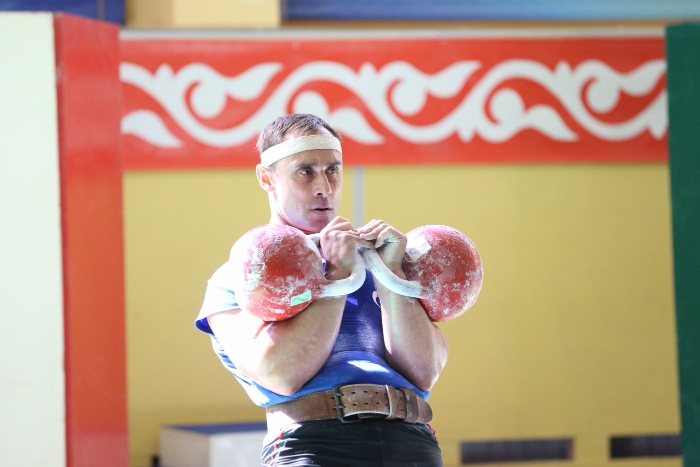 Kettlebell lifting competition. Weight category “90+ kilograms”