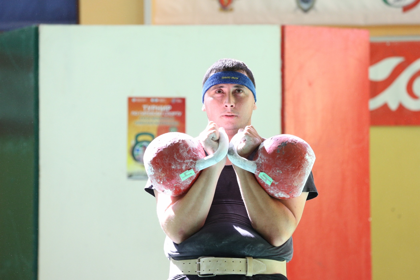 Kettlebell lifting competition. Weight category “90+ kilograms”