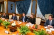 Alexey Miller (center) at working meeting with Jiang Jianqing