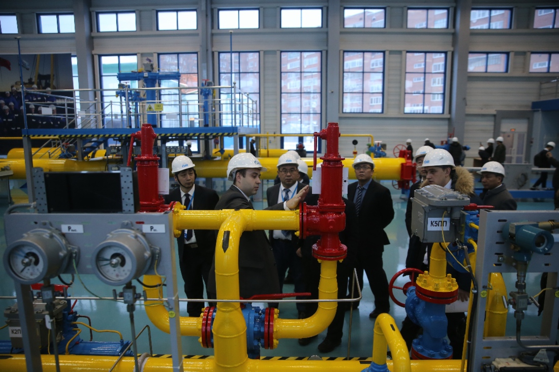 Training participants familiarizing themselves with process equipment at training base of Corporate Institute
