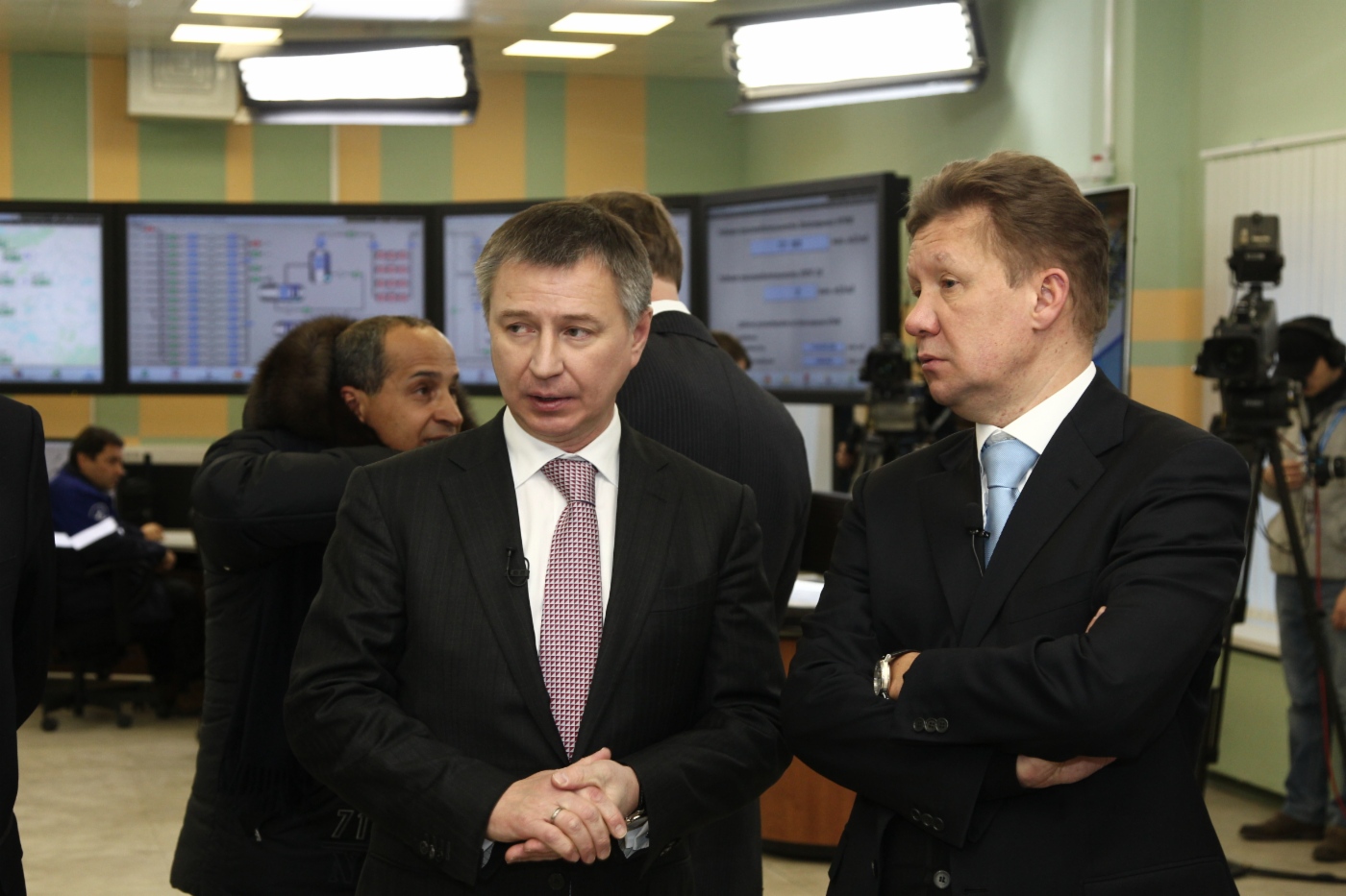 Oleg Andreev, Director General of Gazprom Dobycha Yamburg and Alexey Miller in comprehensive gas treatment unit control room, Zapolyarnoye field