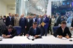 Rustam Minnikhanov, President of Republic of Tatarstan, Viktor Zubkov, Chairman of Gazprom Board of Directors, Director General of Gazprom Gazomotornoye Toplivo and Alexey Miller signing Agreements for Wider 