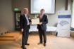 13th meeting of International Supervisory Board of Energy Delta Institute. Eric Dam congratulates Sergey Khomyakov with receiving EDI Honorary Fellow title