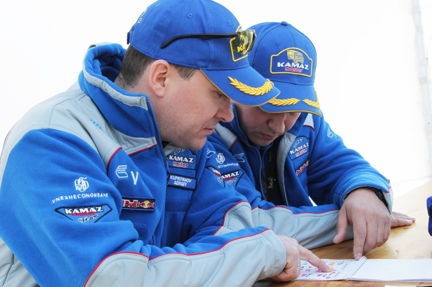 Sergey Kupriyanov and Alexander Kupriyanov studying route of another stage