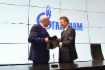 Georgy Poltavchenko, Governor of St. Petersburg, and Alexey Miller signing two Agreements of Cooperation at St. Petersburg International Economic Forum 2017