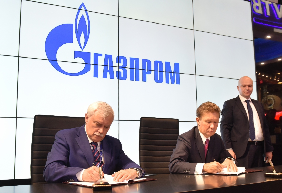 Georgy Poltavchenko, Governor of St. Petersburg, and Alexey Miller signing two Agreements of Cooperation at St. Petersburg International Economic Forum 2017