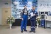 Dmitry Kobylkin (left), Governor of Yamal-Nenets Autonomous Area, handing note of acknowledgement to Sergey Kryukov (right), 6th-grade turner of mechanical and repair service