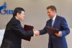 Masami Iijima, Chairman of Board of Directors of Mitsui & Co., Ltd., and Alexey Miller at signing ceremony for Framework Agreement for cooperation on small- and mid-scale LNG